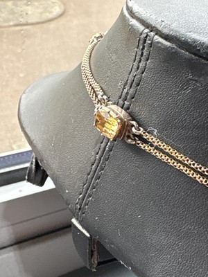 Lot 21 - A 19th Century golden topaz rivière necklace