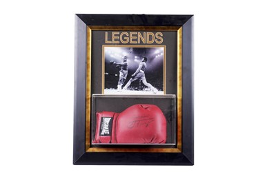 Lot 206 - ﻿A red Lonsdale boxing glove signed by Joe Frazier