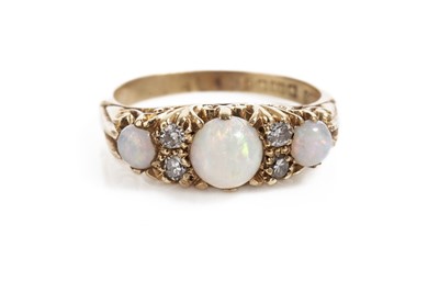 Lot 833 - An opal and diamond ring