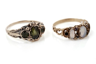 Lot 846 - A peridot three stone ring; and a Victorian opal ring