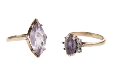 Lot 872 - Two amethyst dress rings