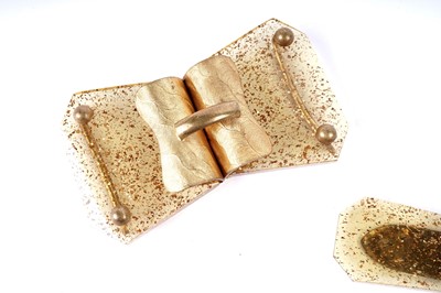 Lot 184 - Three 1930's celluloid buckles