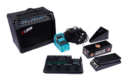 Lot 605 - ﻿A collection of guitar accessories including: a Leem GA-820R amplifier