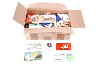 Lot 1370 - A box containing many World stamp booklets