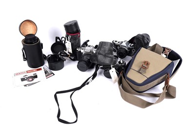 Lot 385 - A selection of Pentax cameras and other lenses