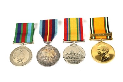 Lot 12 - Three 20th Century medals, ﻿all awarded to 'LAC R. M. Nixon'; and an 'Armed Forces Veteran' medal