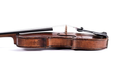 Lot 28 - A cased violin, with bow