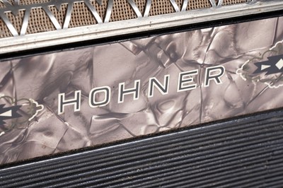 Lot 8 - A vintage Hohner 21-button accordion