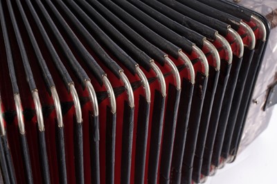 Lot 8 - A vintage Hohner 21-button accordion