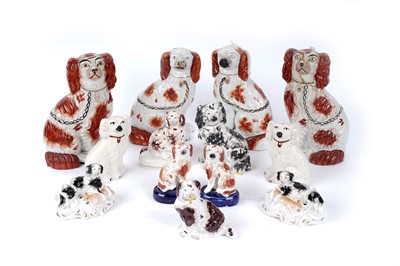 Lot 407 - A quantity of Staffordshire dogs; and a pair of pen holders