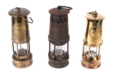 Lot 1432 - Three miners' lamps