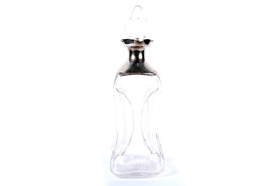 Lot 994 - A silver mounted blown glass decanter of hourglass form