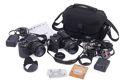 Lot 252 - Digital cameras by Fuji and Olympus; with other items