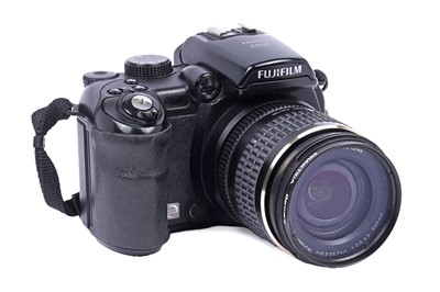 Lot 252 - Digital cameras by Fuji and Olympus; with other items