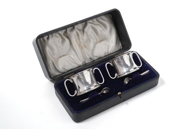 Lot 1026 - An Edward VII cased silver condiment set