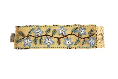 Lot 1490 - A Victorian Romantic Period needlework cuff bracelet