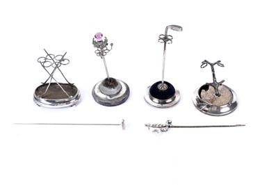 Lot 241 - A collection of silver and plated novelty pin cushions and hat pins; and other items