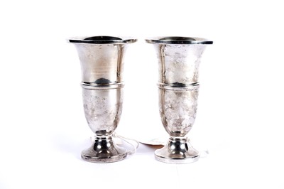 Lot 1030 - A pair of George V silver trumpet vases