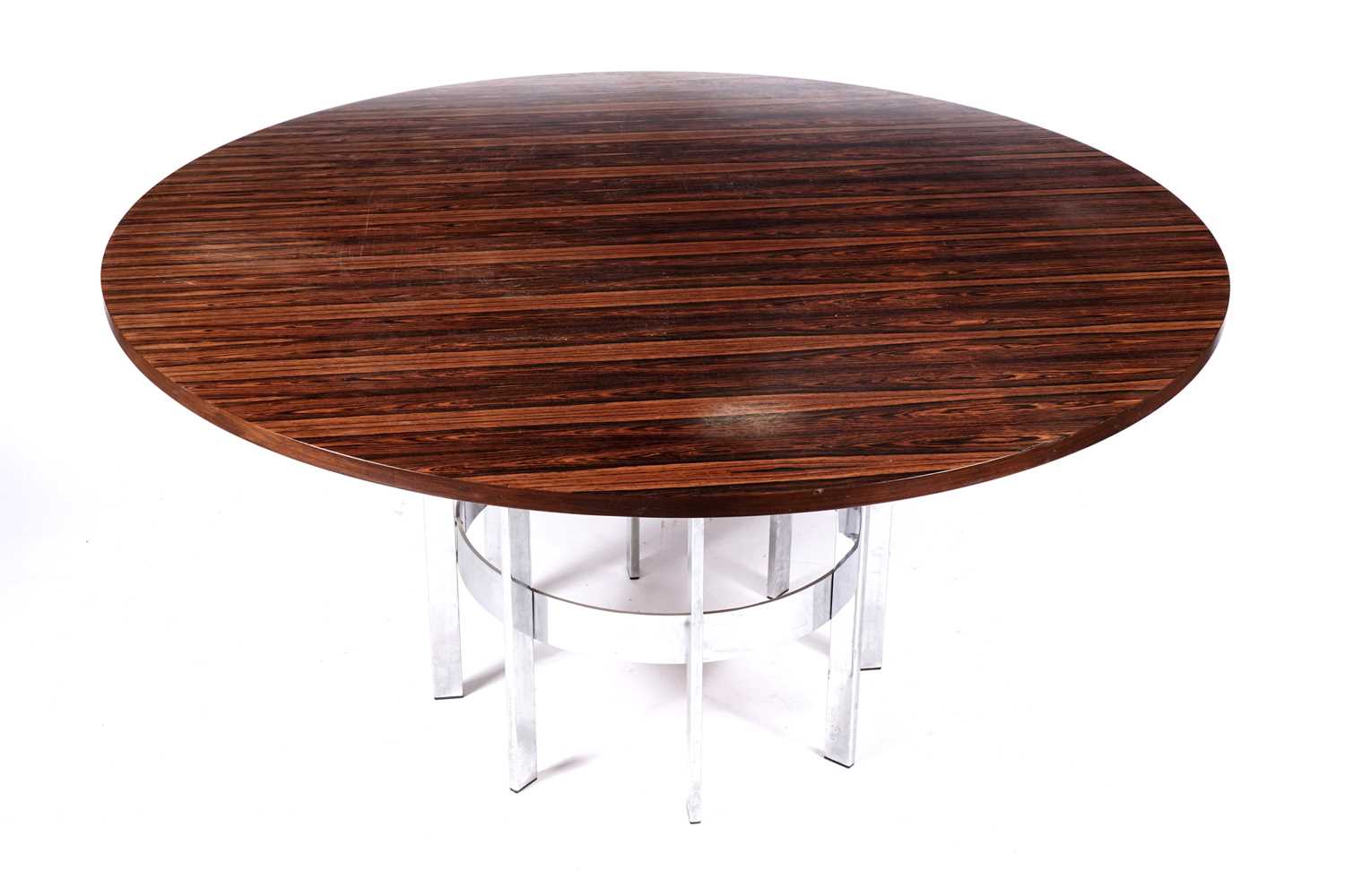 Lot 62 - Richard Young for Merrow and Associates: a circular rosewood topped dining table