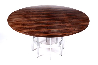 Lot 62 - Richard Young for Merrow and Associates: a circular rosewood topped dining table