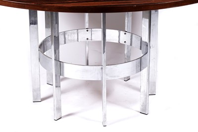 Lot 62 - Richard Young for Merrow and Associates: a circular rosewood topped dining table