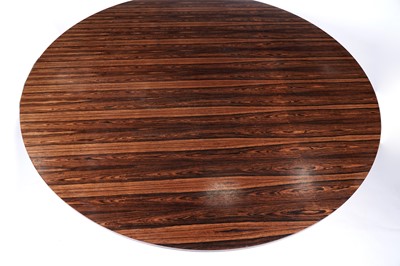 Lot 62 - Richard Young for Merrow and Associates: a circular rosewood topped dining table