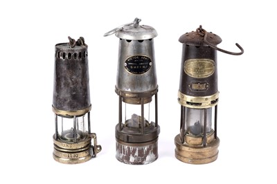 Lot 1457 - Three miners’ lamps