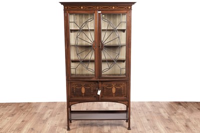 Lot 452 - An Edwardian inlaid mahogany display cabinet