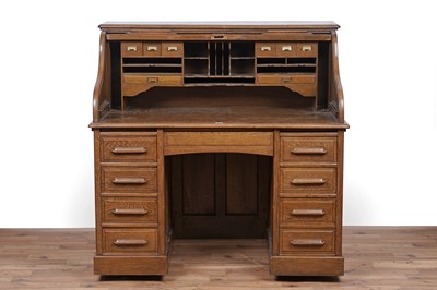 Lot 88 - An early 20th Century oak rolltop desk