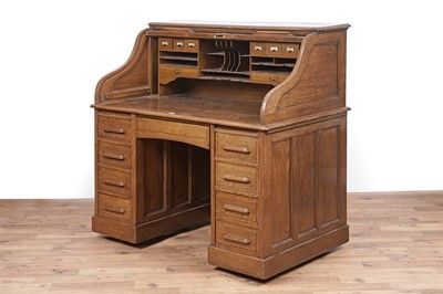 Lot 88 - An early 20th Century oak rolltop desk