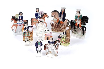 Lot 397 - Nine Staffordshire figures