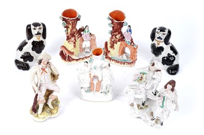 Lot 399 - Seven Staffordshire figures