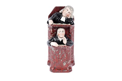 Lot 404 - A Staffordshire group 'The Vicar and Moses'