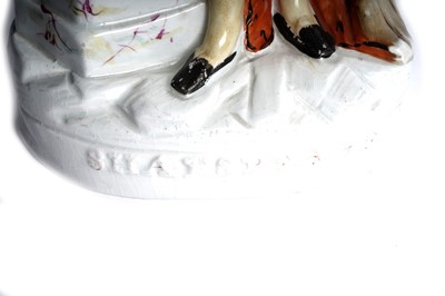 Lot 1095 - A Staffordshire figure of Shakespeare