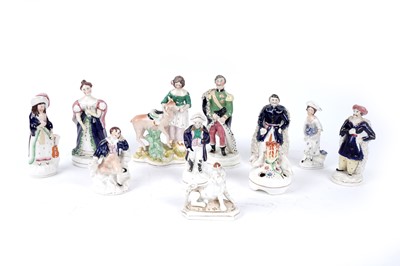 Lot 405 - Eleven small Staffordshire figures