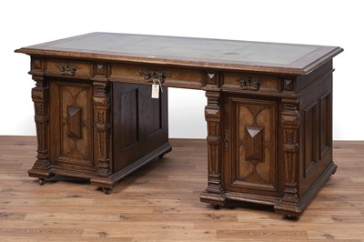 Lot 44 - An early 20th Century German carved oak pedestal desk