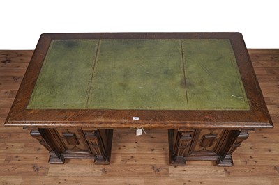 Lot 44 - An early 20th Century German carved oak pedestal desk