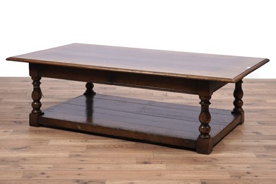 Lot 50 - Titchmarsh and Goodwin: a carved oak coffee table