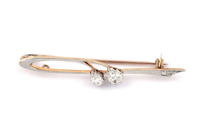 Lot 27 - A diamond two stone bar brooch