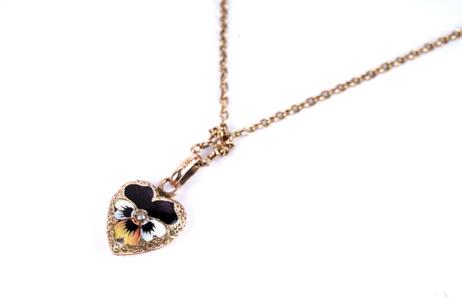 Lot 26 - A Victorian seed pearl and enamel locket pendant necklace