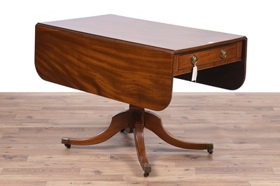 Lot 102 - A kneehole desk; and a Pembroke table