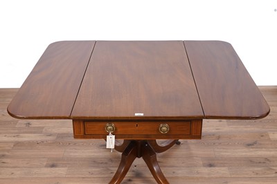 Lot 102 - A kneehole desk; and a Pembroke table