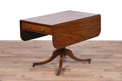 Lot 102 - A kneehole desk; and a Pembroke table