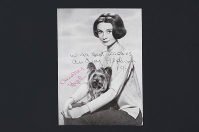 Lot 721 - An Audrey Hepburn autographed photographic postcard