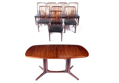 Lot 41 - Svend Aage Madsen for Norre Broby: an extending teak dining table and eight dining chairs