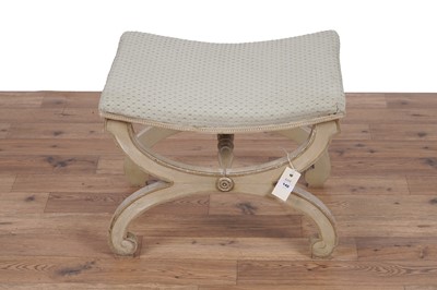 Lot 140 - A Regency style stool