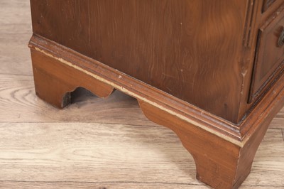 Lot 135 - A pair of Georgian style yew veneered bedside chests