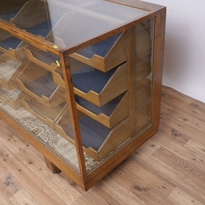 Lot 147 - An early 20th Century oak haberdashery cabinet