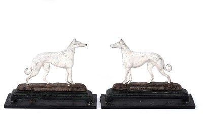 Lot 245 - A pair of cast iron greyhound pattern door stops