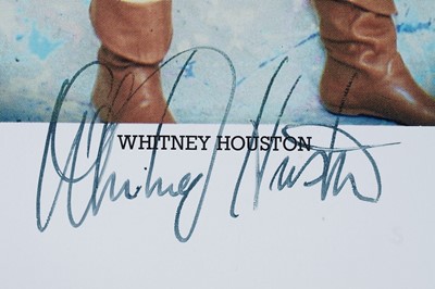 Lot 734 - A Whitney Houston autographed photographic postcard from the How Will I Know album
